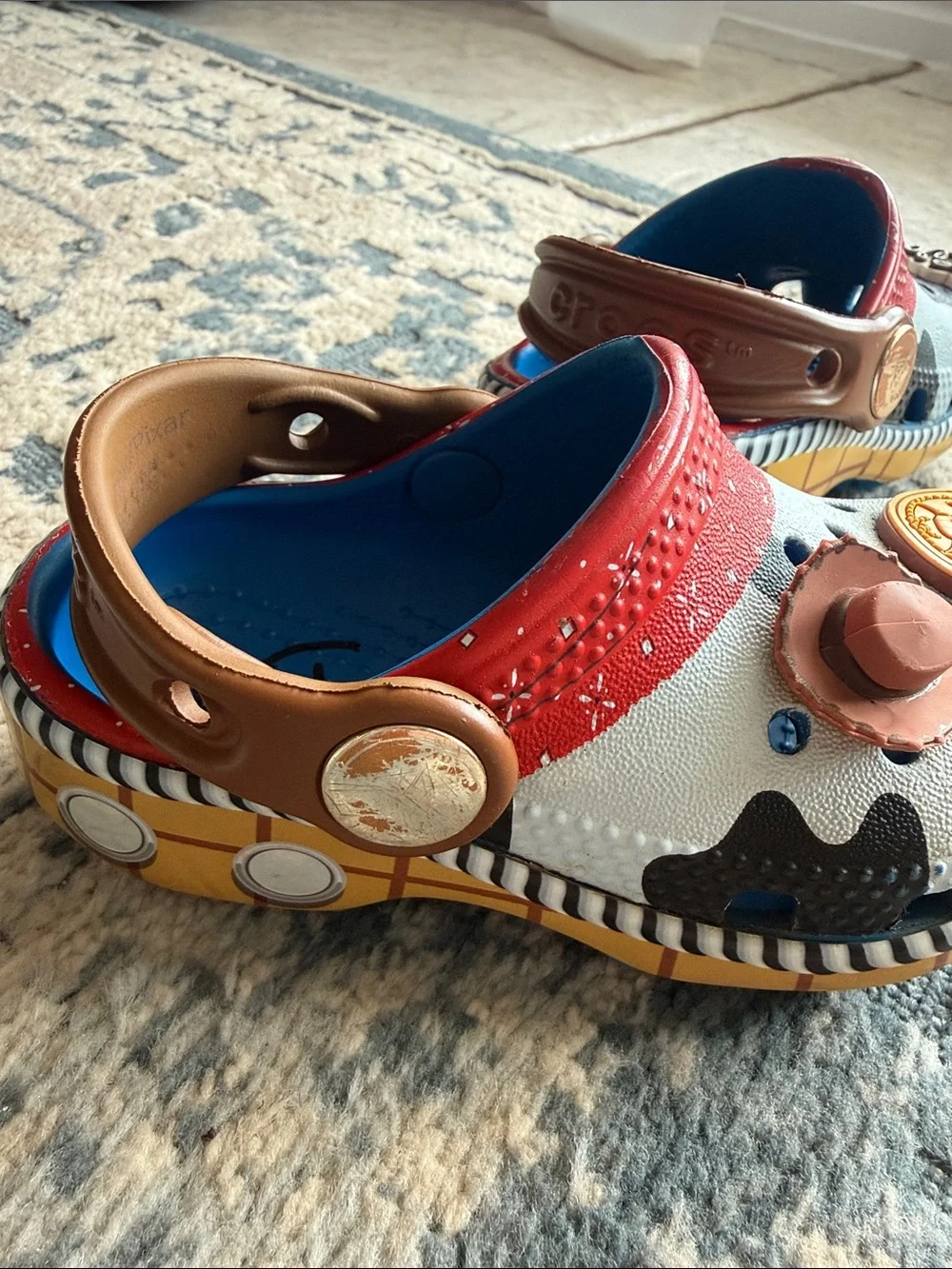 Disney x Toy Story Woody Cowprint Kids Crocs - White, Red, Brown